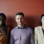 diverse people engaging with technology