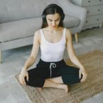 person meditating at home