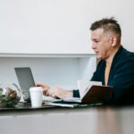 person working on laptop at home