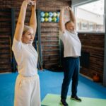 senior stretching outdoors